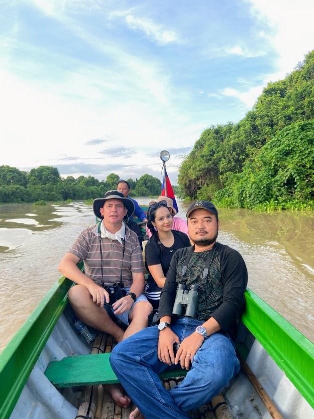 IUCN RIT and CEPF with FACT traveling by boat to the community protected area in Tonle Sap Lake. 