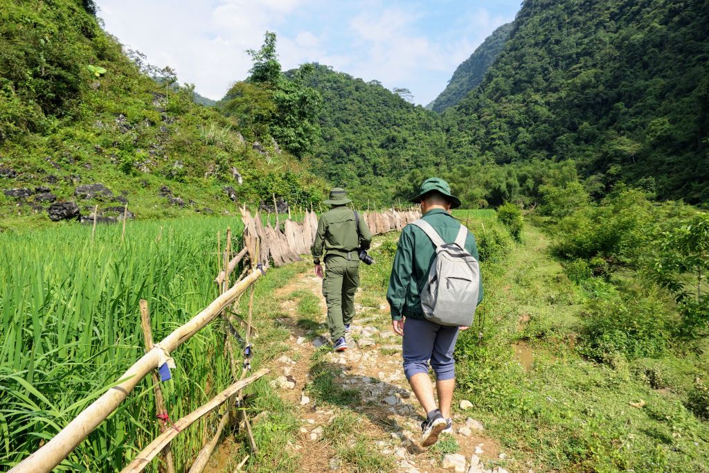 IUCN and FFI traveling by foot to the Cao-vit Gibbon Species and Habitat Conservation Area