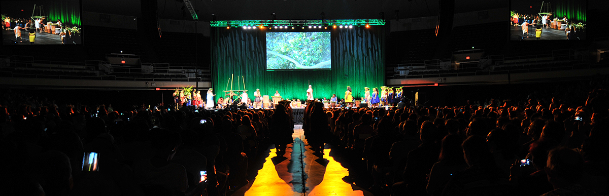 Delegates watch traditional hawaiian dancers during the Opening Ceremony