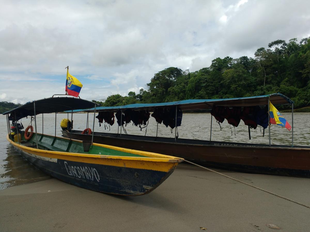 Columbian Boats in River