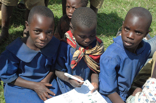 Children learn about forest restoration in Rwanda.