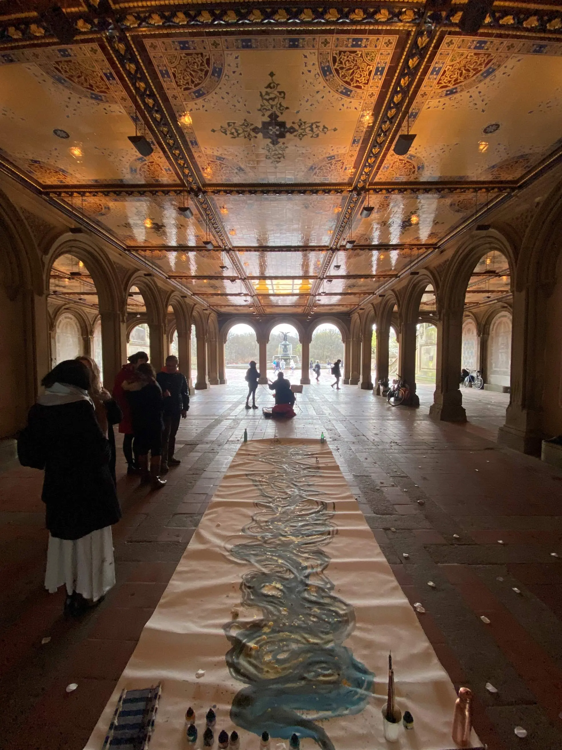 a painting laying on the floor of a hallway